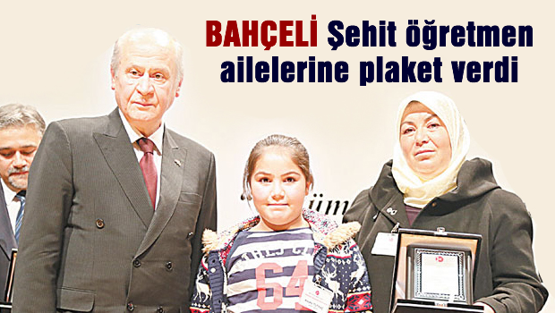 Bahçeli Şehit öğretmen ailelerine plaket verdi