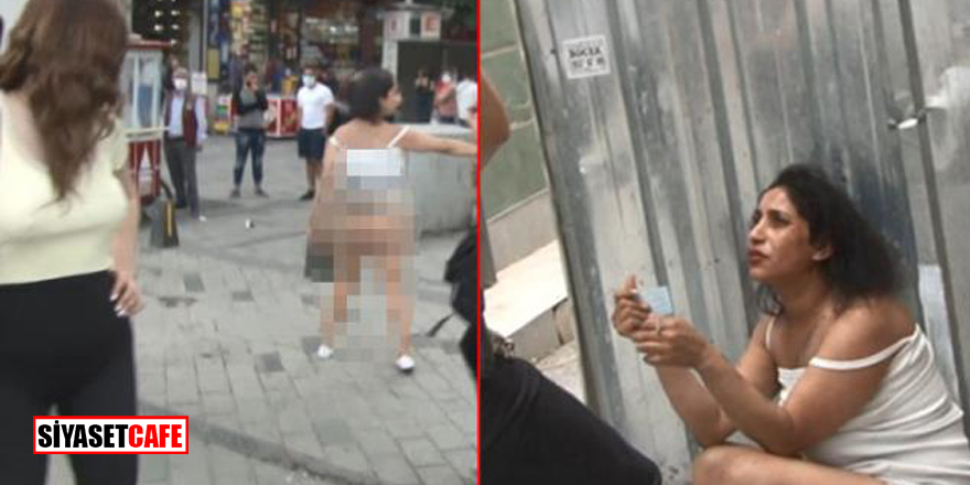 Taksim Meydanı'nda bir kadın gözaltına alınmamak için soyundu!