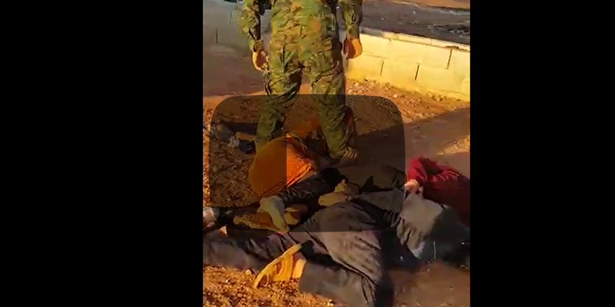 Terörist YPG'den sivillere işkence Üzerilerine pisledi