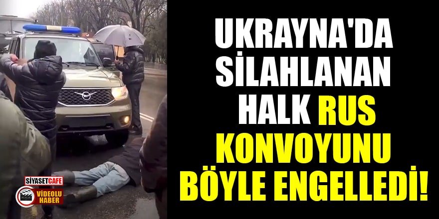 Ukrayna'da silahlanan halk, Rus konvoyunu böyle engelledi!
